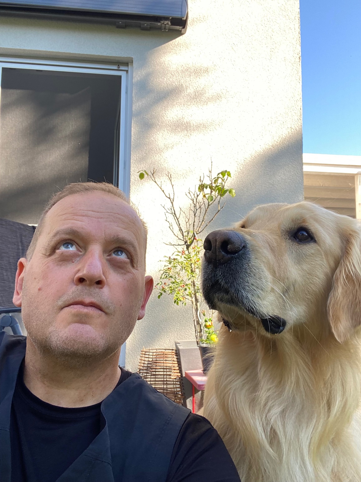 Andras with his golden retriever